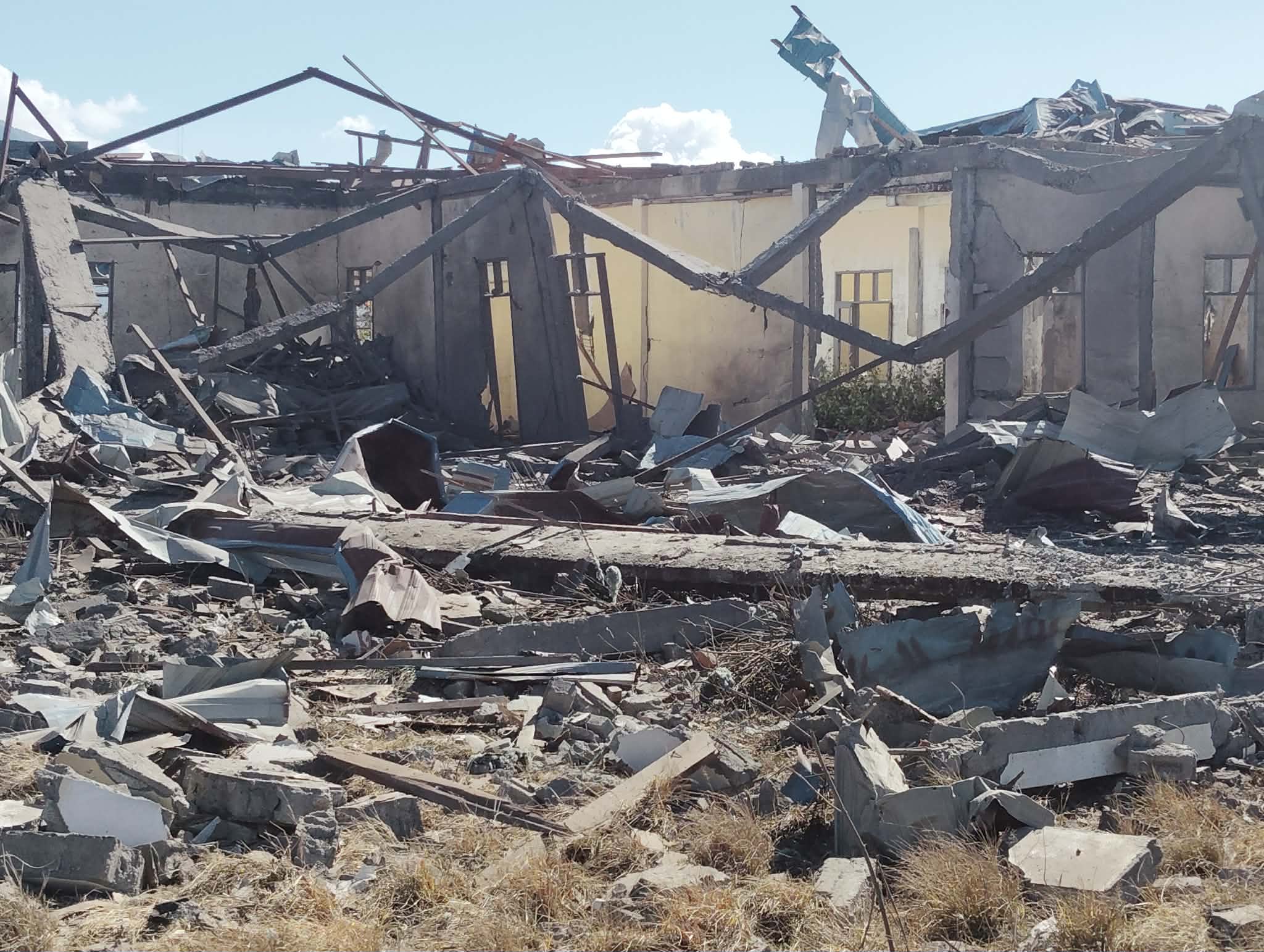 One of the houses destroyed by SSPC's airstrikes in Tibual village in Falam township (Photo: Facebook/Khonumthung Burmese)