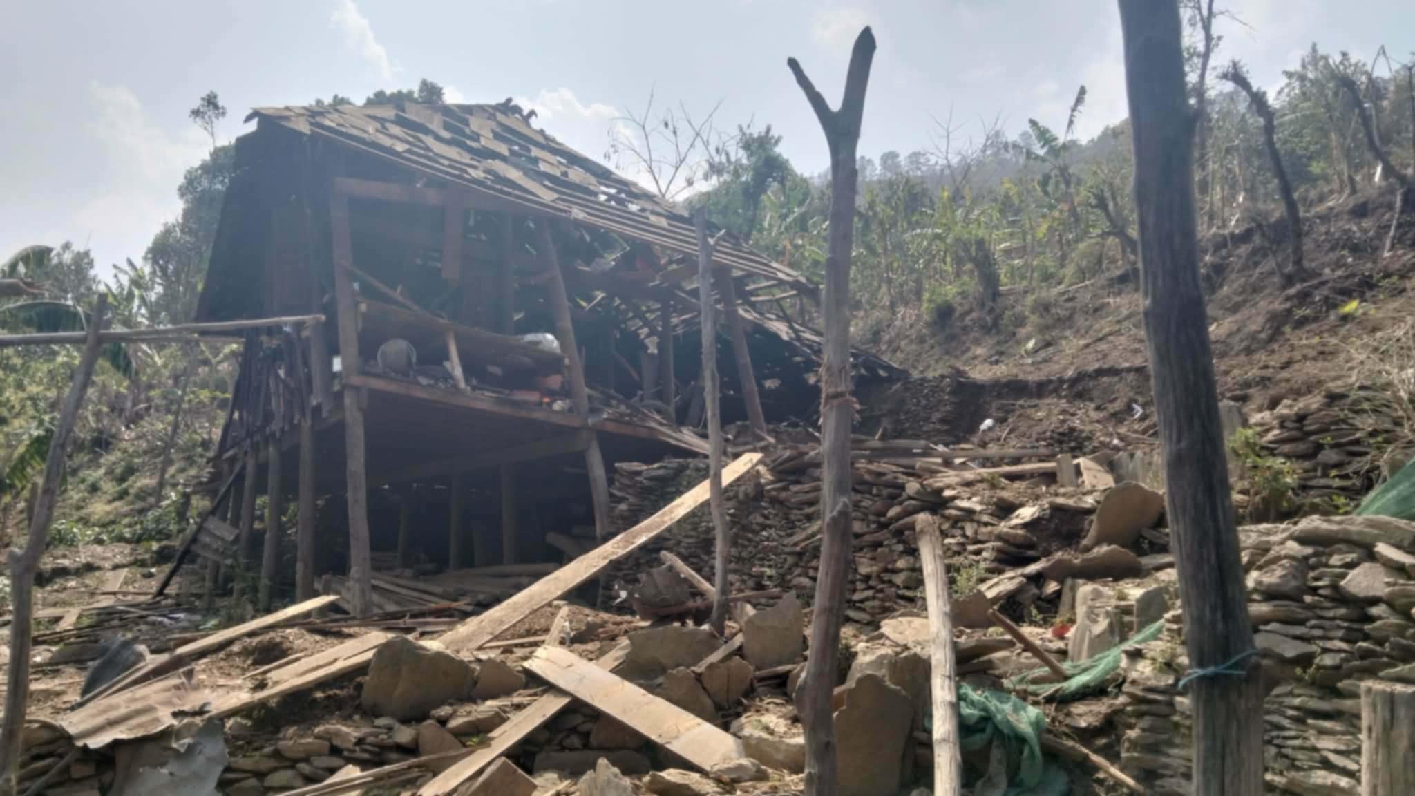 One of the civilian houses destroyed by SSPC airstrikes in Lunghawh village, Falam township (Photo: Khonumthung Burmese)