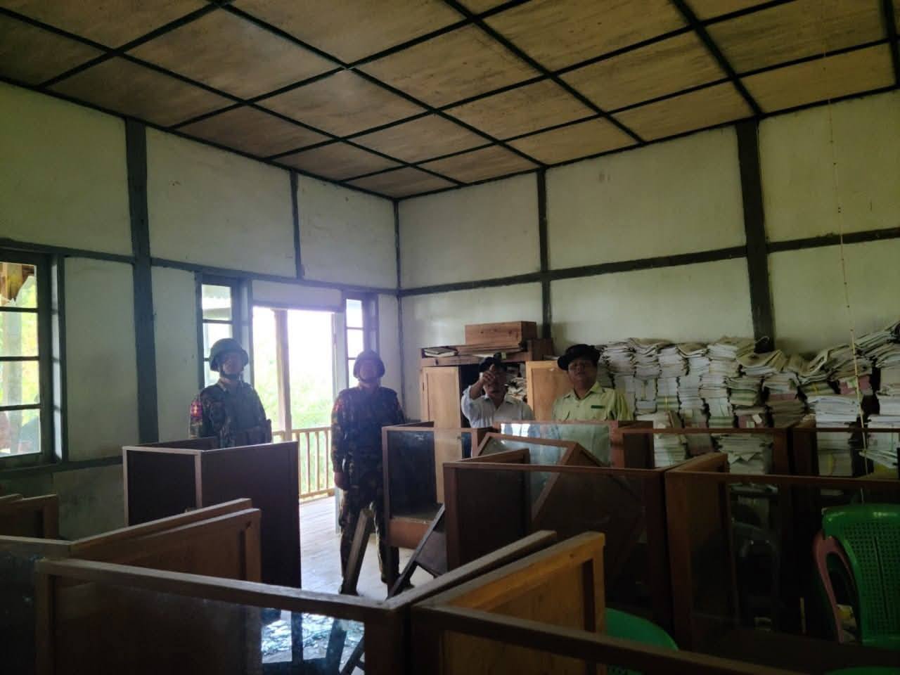 A photo showing SSPC local authorities together with soldiers inspecting schools in Falam town (Photo: Facebook/Surbung Times)