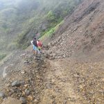 A damaged section of the Gangaw–Rezua road after heavy rains caused landslides in the area. (Photo: Facebook /Salai Thomas Mg)