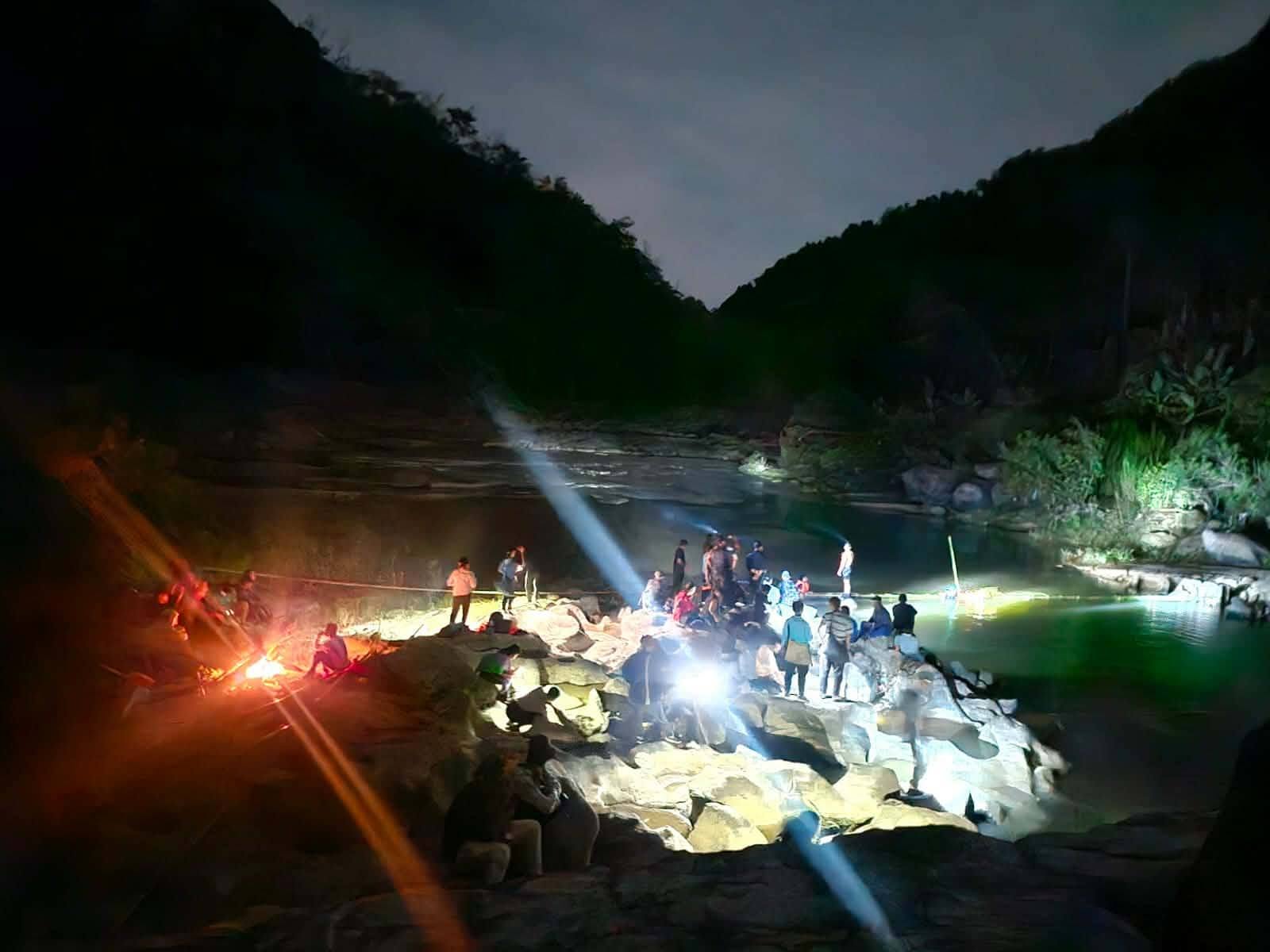 Members of the search and rescue team at Tlawng river as the search continues at night (Photo: Facebook/The Chin Post)