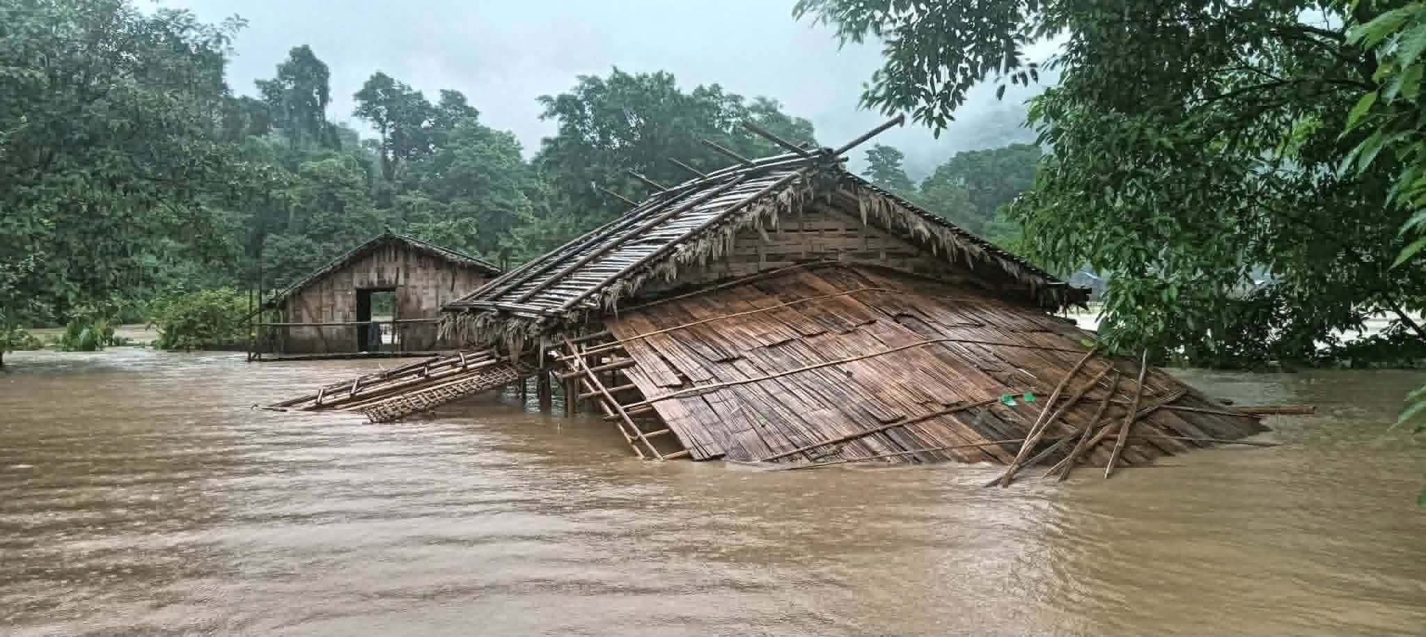 Some of the civilian bamboo houses submerged and destroyed by the flooding in Paletwa township on 7 July 2026 (Photo: Facebook/Chin World)